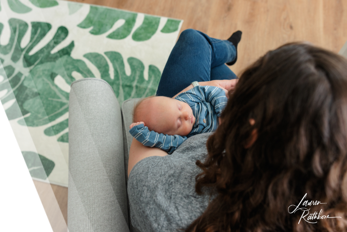 Baby sleeping while mom and dad holds him
